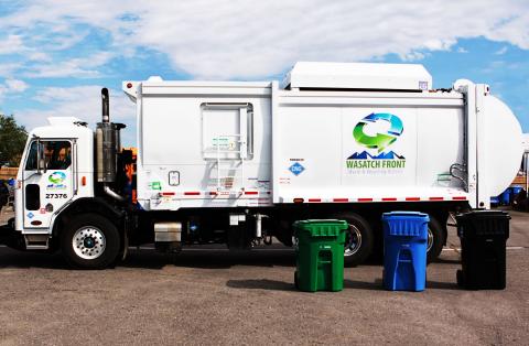 WFWRD collection truck with recycling and refuse containers